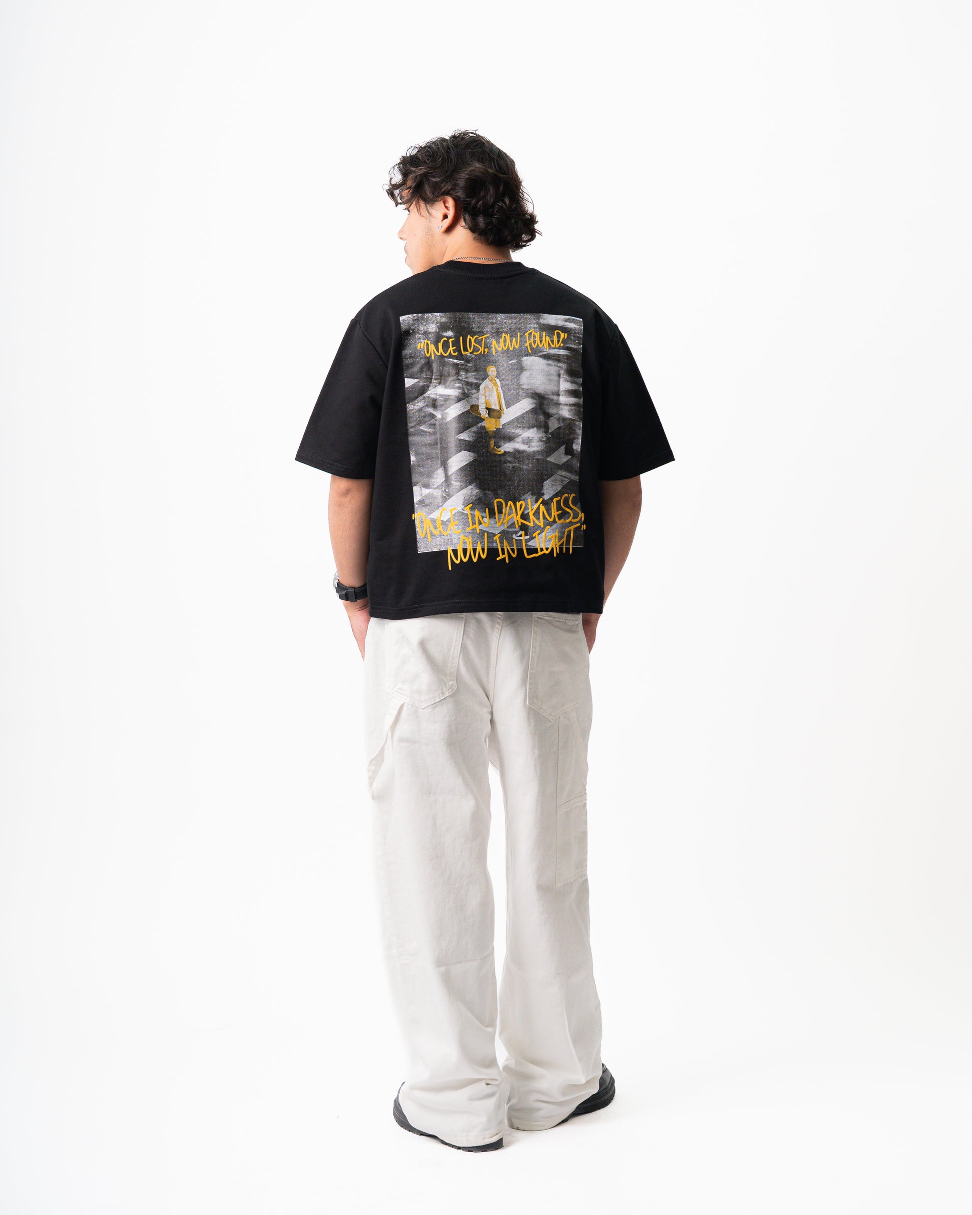 NOW IN LIGHT Oversized Unisex Tee – Black