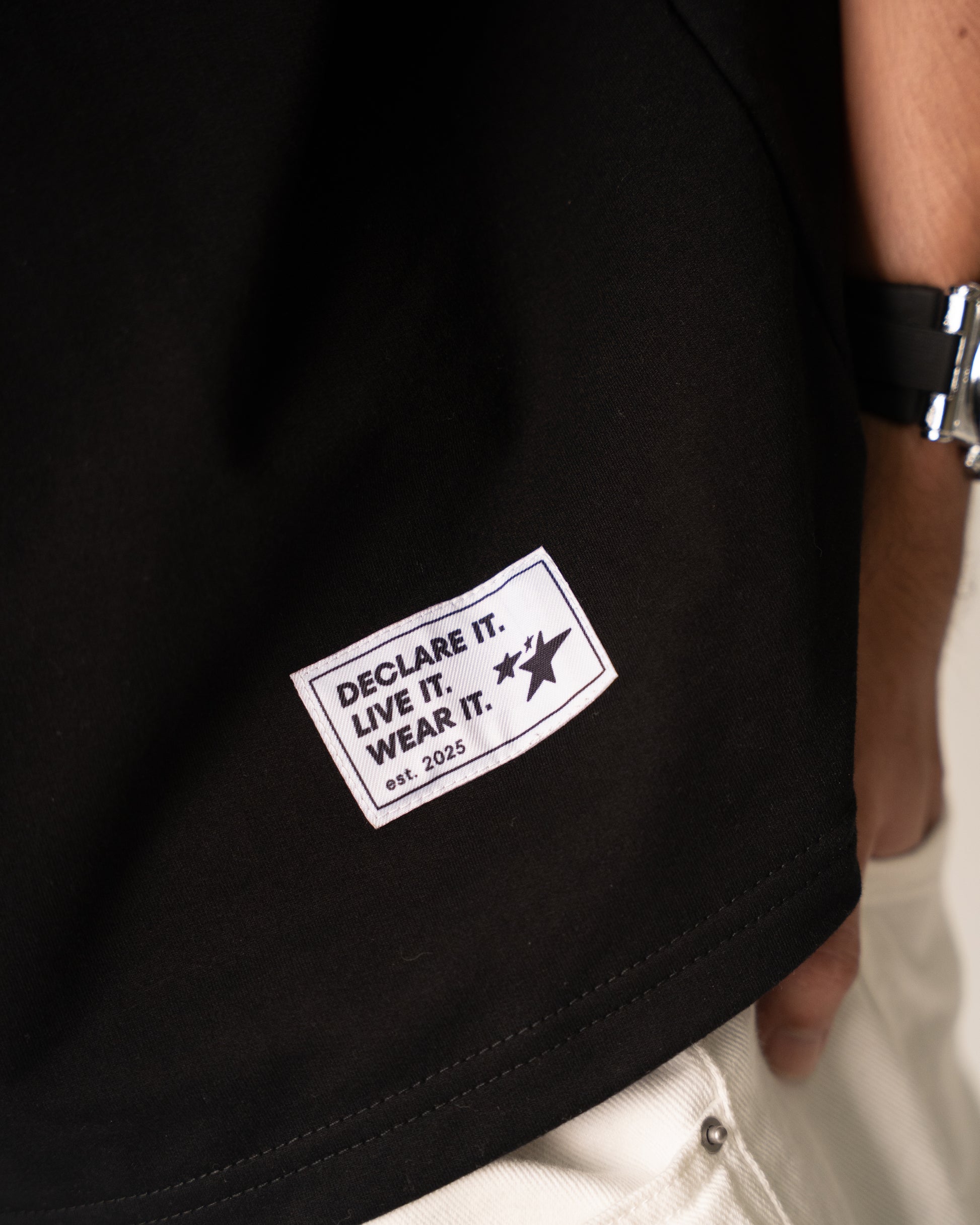 NOW IN LIGHT Oversized Unisex Tee – Black