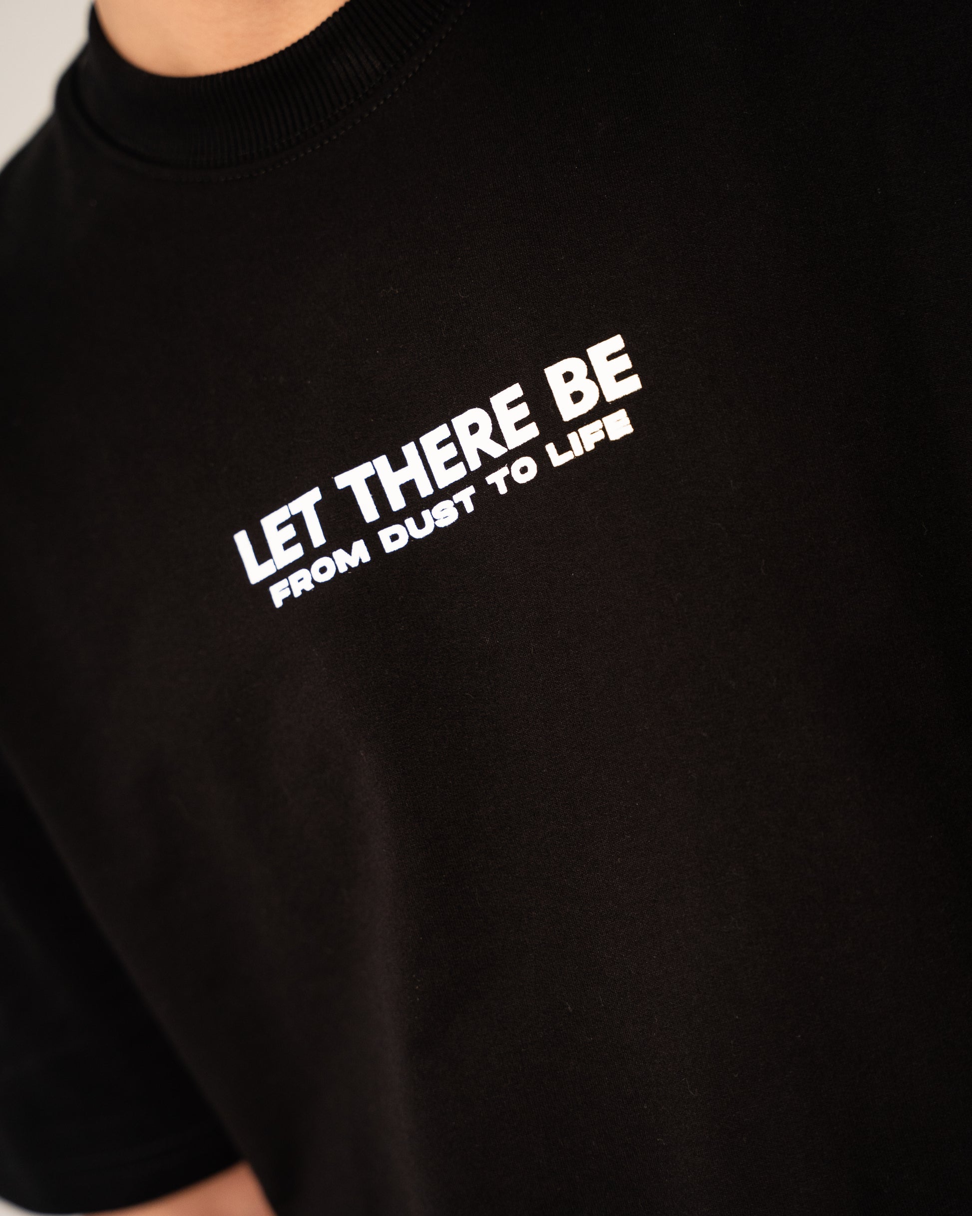 NOW IN LIGHT Oversized Unisex Tee – Black